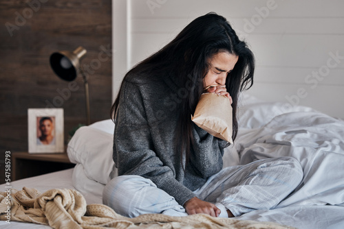 Konstfotografi Woman, anxiety and paper bag stress breathing on bed in house or home bedroom in divorce crisis, marriage fail or widow grief