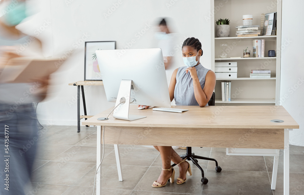 Covid, office and black woman with busy people with face mask for health safety in workplace. Corporate, business and female worker using internet, working on computer and focused at desk in pandemic Covid, office and black woman with busy people with face mask for health safety in workplace. Corporate, business and female worker using internet, working on computer and focused at desk in pandemic