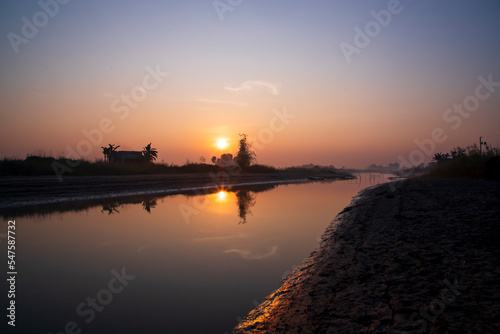 Beautiful Golden hour Sunrise landscape view near the Padma river in Bangladesh © Artyponds