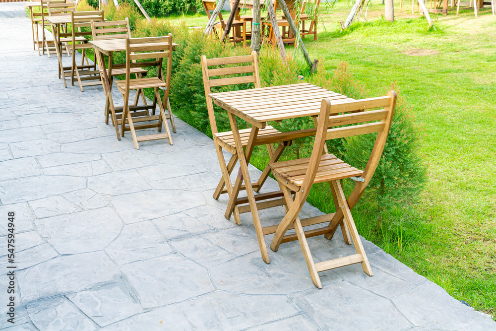 wood table and chair in outdoor coffee shop cafe and restaurant