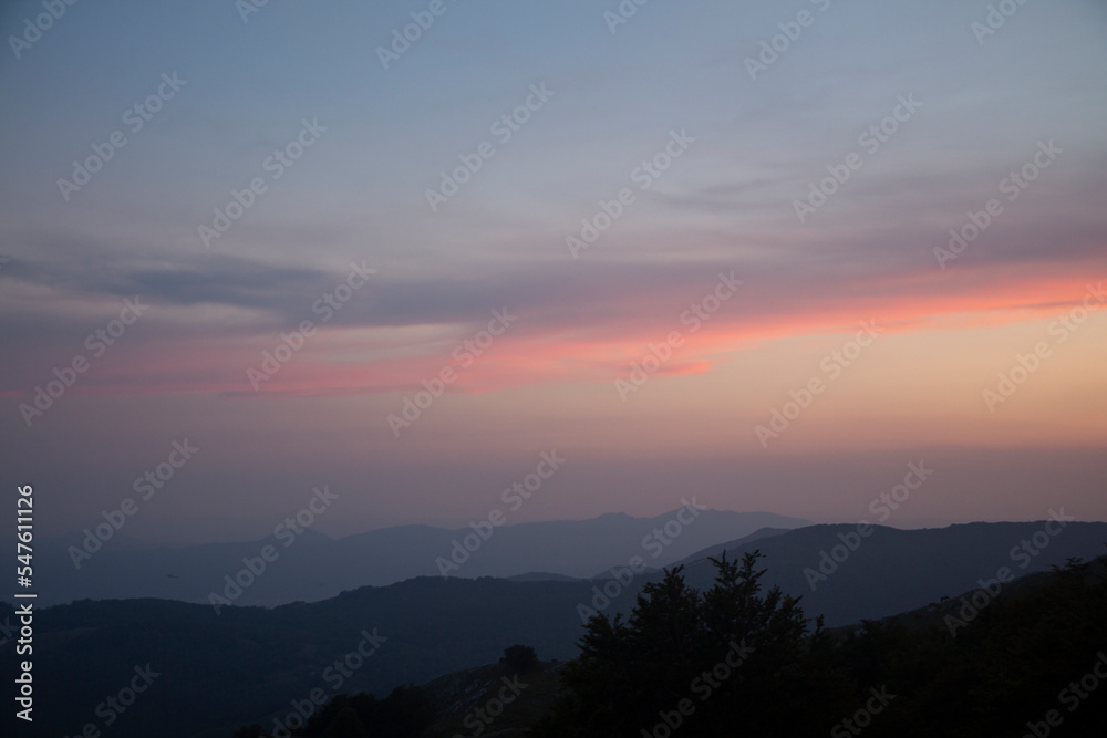 sunset on the mountain summit at miletto in matese park