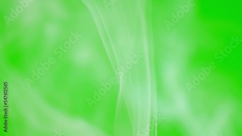 White smoke floating slow motion on green screen background