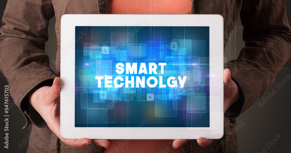 Person holding tablet, technology concept Person holding tablet, technology concept