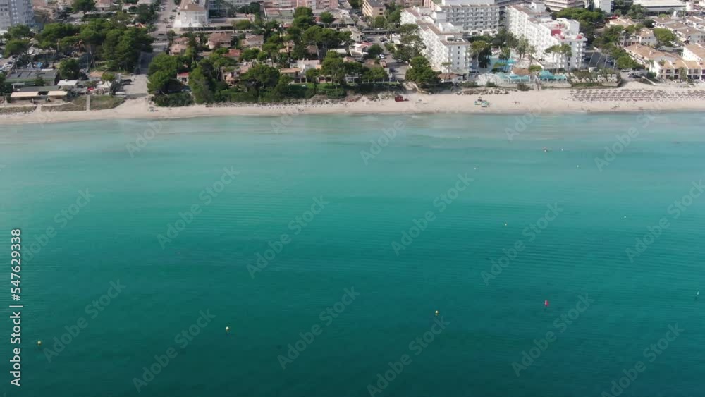 Beautiful panoramic view of Playa de Muro beach in Majorca with an amazing turquoise sea,. Concept of summer, travel, relax, hotel, holiday and enjoy Beautiful panoramic view of Playa de Muro beach in Majorca with an amazing turquoise sea,. Concept of summer, travel, relax, hotel, holiday and enjoy