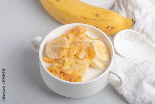 Fototapeta Naklejka Na Ścianę i Meble -  Cornflakes breakfast, banana, fresh milk, healthy food