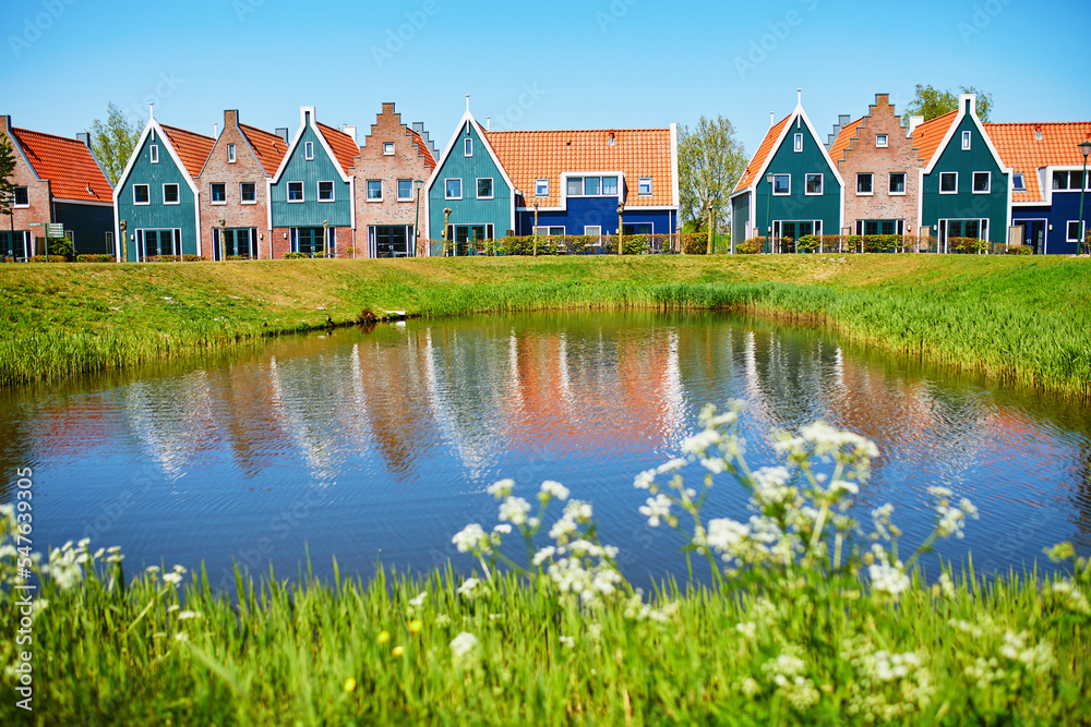 Colorful houses in marine park in Volendam Colorful houses in marine park in Volendam