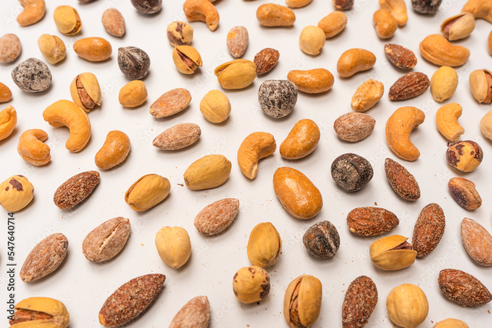 A group of almonds, pistachios, walnuts, macadamia, cashews. A group of almonds, pistachios, walnuts, macadamia, cashews.