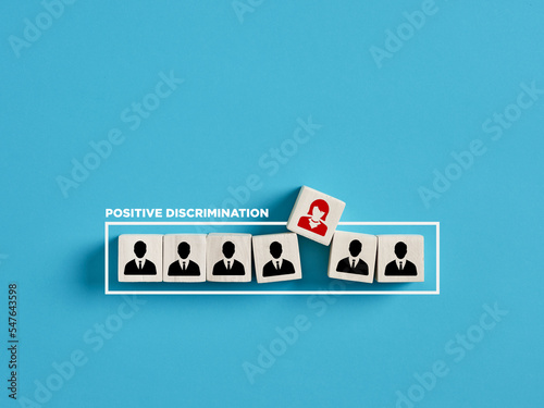 Positive gender discrimination in business workplace concept. photo