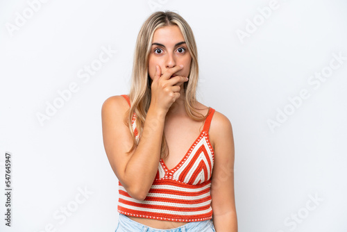 Young caucasian woman isolated on white background surprised and shocked while looking right