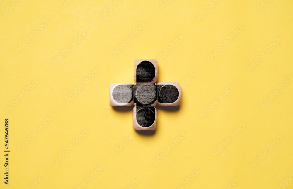 Black plus sign on yellow background for positive thinking mindset of personal development benefit and health insurance concept by 3d rendering. Black plus sign on yellow background for positive thinking mindset of personal development benefit and health insurance concept by 3d rendering.