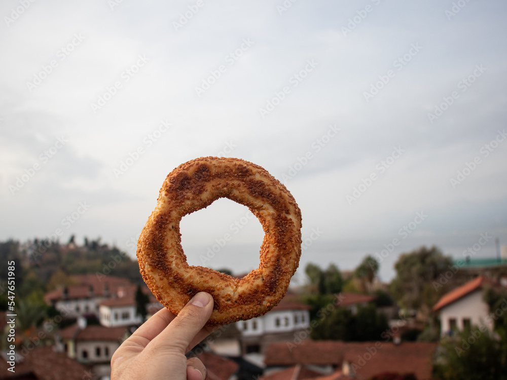 Traditional simit bagel street food snack at the background of sea, trael and Snack Concept Traditional simit bagel street food snack at the background of sea, trael and Snack Concept