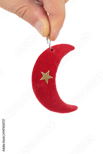Christmas toy in the shape of a crescent moon.