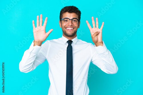 Young business Brazilian man isolated on blue background counting nine with fingers