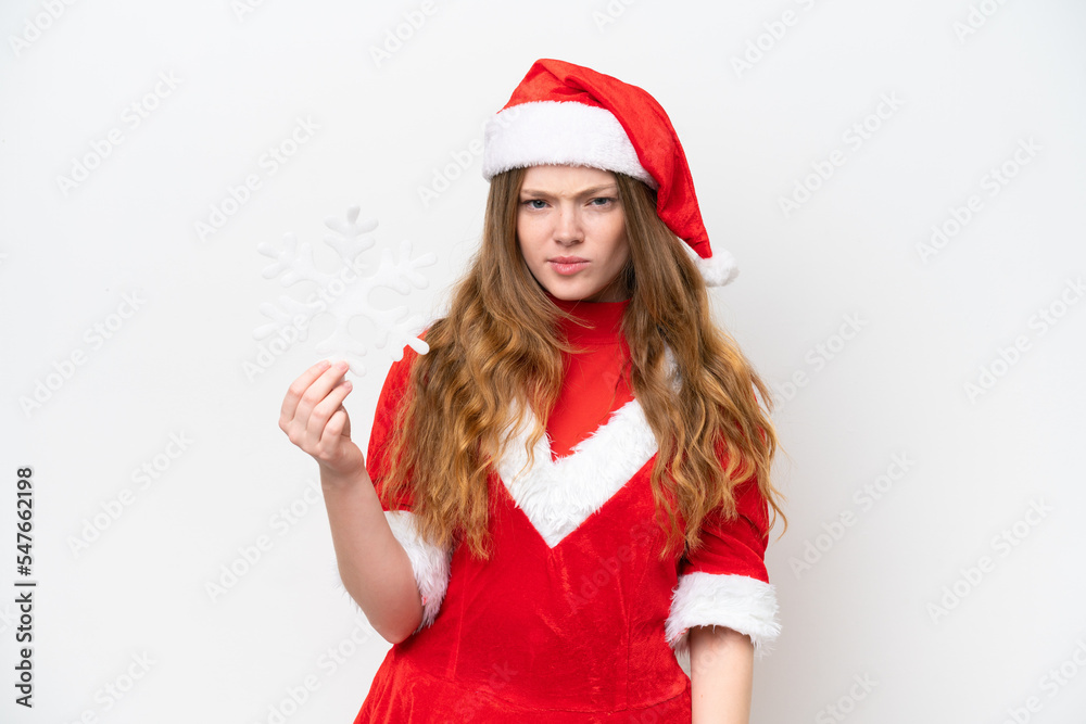 Young caucasian woman with Christmas dress holding snowflake isolated on white background with sad expression Young caucasian woman with Christmas dress holding snowflake isolated on white background with sad expression