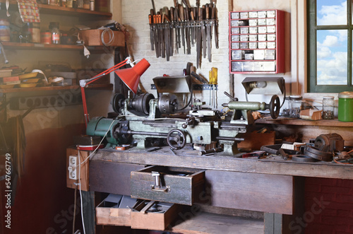 Many different repairing retro tools at workshop photo