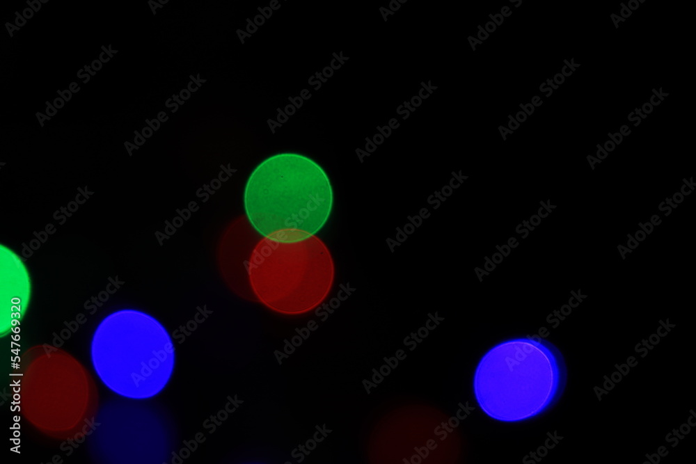 abstract blurred of blue and silver glittering shine bulbs lights background:blur of Christmas wallpaper decorations concept.xmas holiday festival backdrop:sparkle circle lit celebrations display abstract blurred of blue and silver glittering shine bulbs lights background:blur of Christmas wallpaper decorations concept.xmas holiday festival backdrop:sparkle circle lit celebrations display