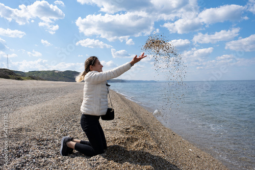 woman jumping on the beach