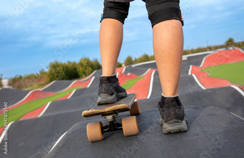 young boy on skateboard in skatepark