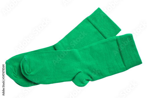 Pair of green socks on white background, top view