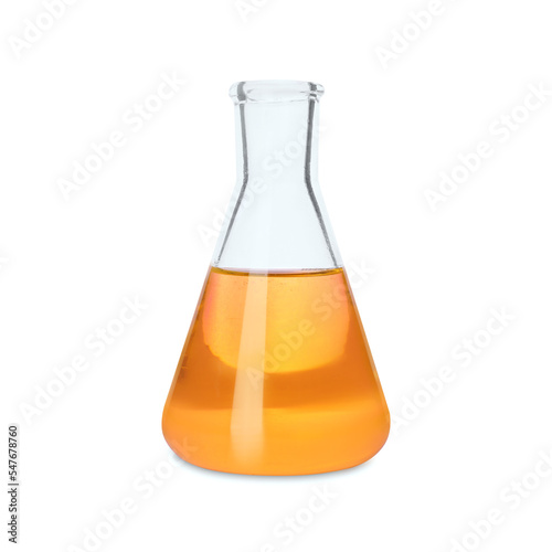Glass flask with orange liquid isolated on white