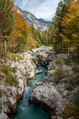 The Soca river flowing through a wild mountain landscape of the Julian Alps in Slovenia