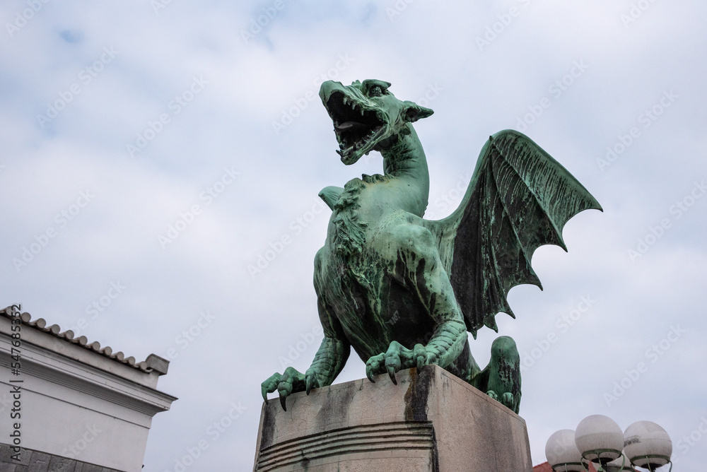 A dragon statue on the Dragon Bridge, a symbol of the city of Ljubljana, Slovenia