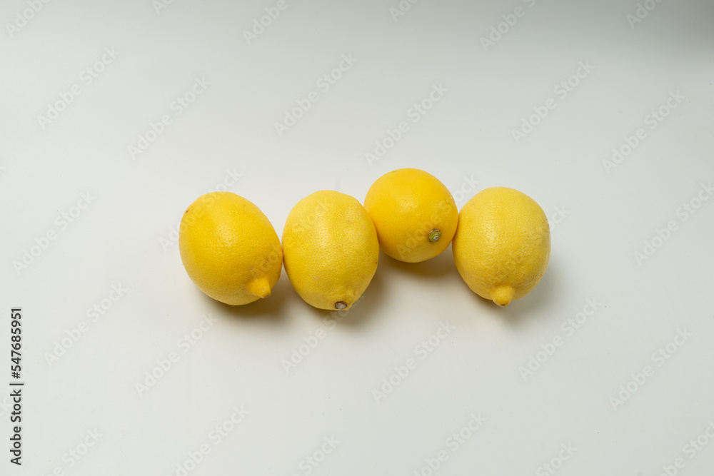 Yellow juicy beautiful lemon lying on the table Yellow juicy beautiful lemon lying on the table