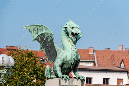 A dragon statue on the Dragon Bridge, a symbol of the city of Ljubljana, Slovenia