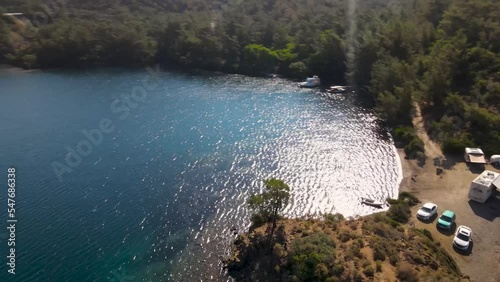 Beautiful seashore. Islands in the distance. Colorful blue sea. The beauty of Turkey. Beautiful rocks and mountains. Sunny clear day. Beautiful water.