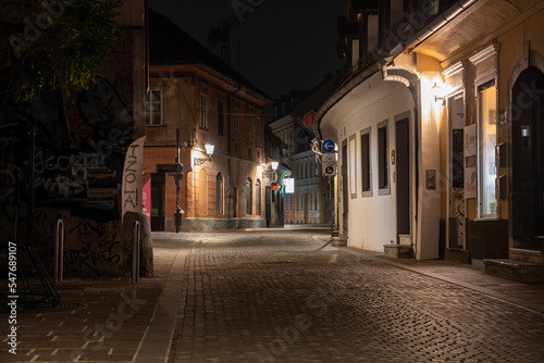 Scenic abandoned alley Trubarjeva in the city center of Ljubljana at night