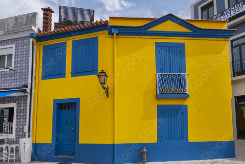 Street view in the heart of Historic Center of Aveiro: typical colorful Portuguese houses. AVEIRO, PORTUGAL. 