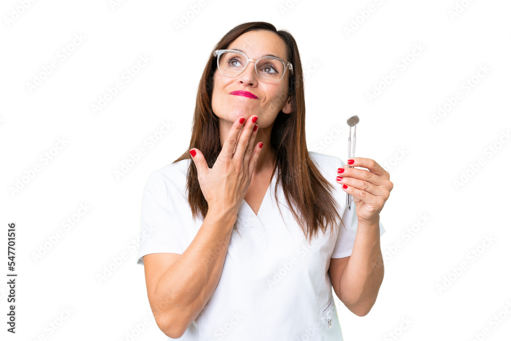 Dentist caucasian woman over isolated chroma key background looking up while smiling