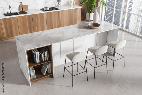 Top view of kitchen interior with bar countertop and cooking area  panoramic window