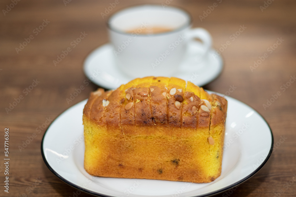 fruit cake with a cup of tea on the table 