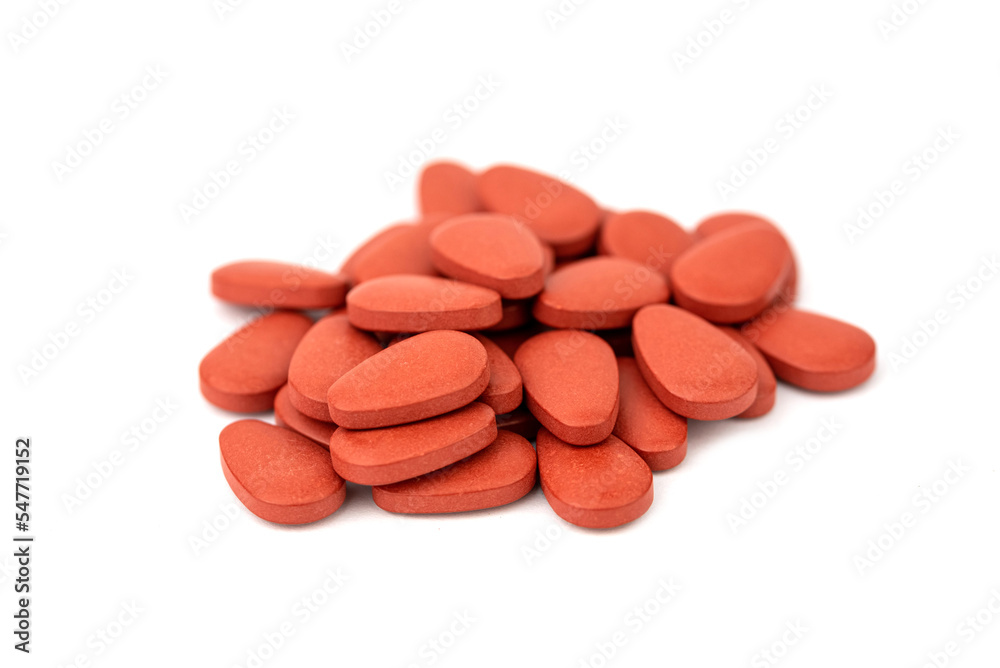 the red pills isolated on the white background the red pills isolated on the white background