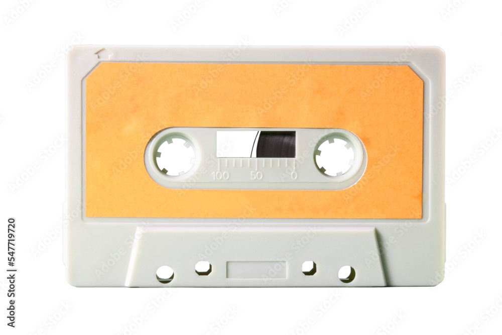An old vintage cassette tape from the 1980s (obsolete music technology). White-grey plastic body and warm yellow label, isolated on white.	cassette,tape,white,grey,yellow,warm,used,vintage,music,1980s