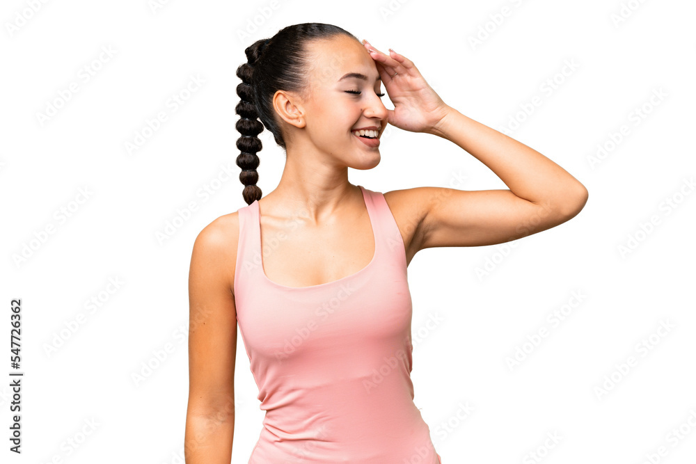 Young Arab woman over isolated background smiling a lot Young Arab woman over isolated background smiling a lot