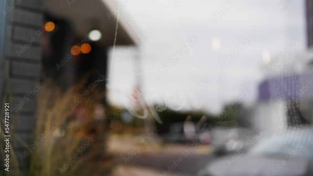Employee opening coffee shop, turning sign board on door, small urban business Employee opening coffee shop, turning sign board on door, small urban business