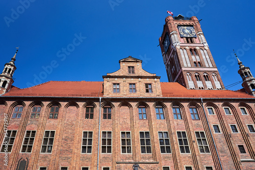 The facade and towers of the historic Gothic town hall in Torun