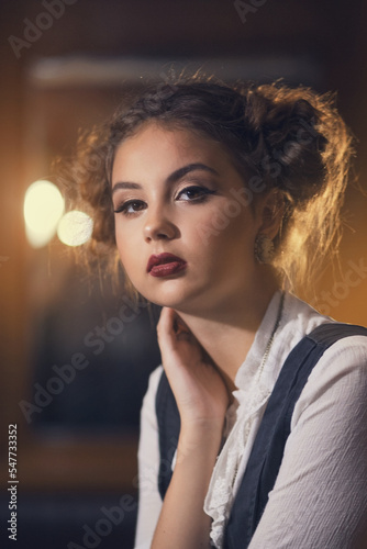 Wallpaper Mural Beautiful young girl closeup in a carnival steampunk outfit in a dark compartment of a train Torontodigital.ca