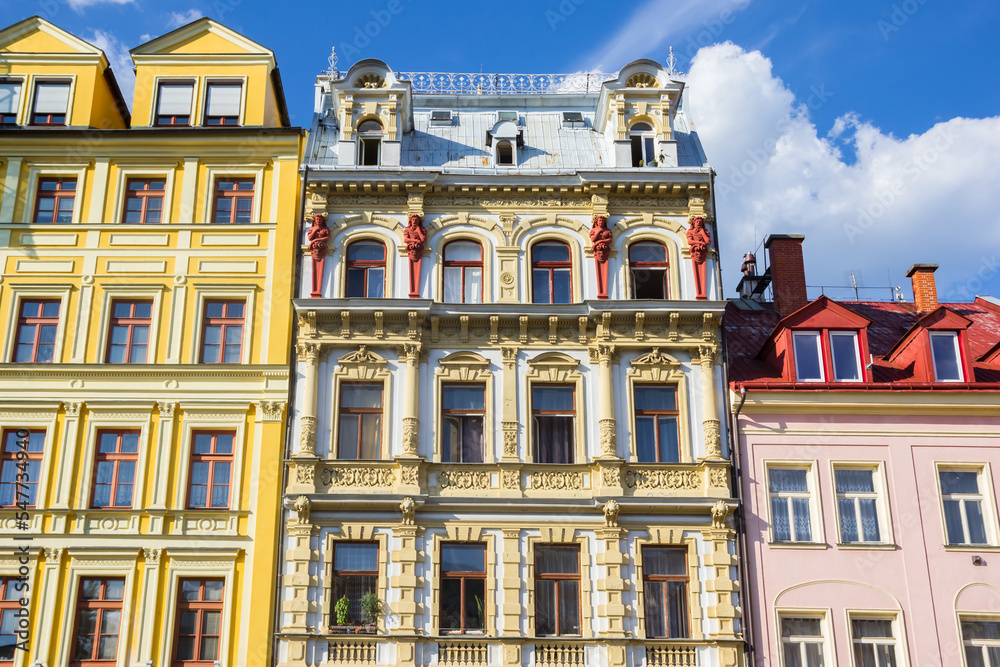 Front facade of yellow historic buildings in Liberec, Czech Republic