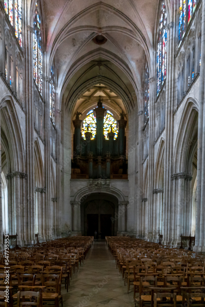 Fototapeta premium view of the central nave and church organ inside the Troyes Cathedral