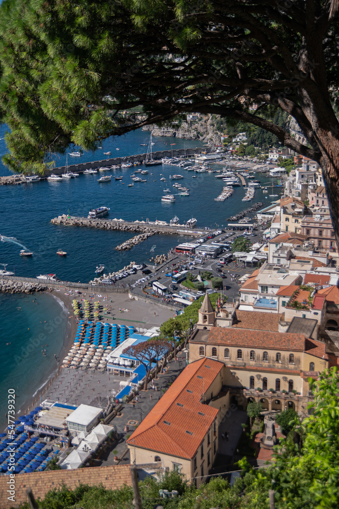 Beautiful view of the Amalfi Coast. Italian summer resort on shores of the Tyrrhenian Sea, small neat colored houses.