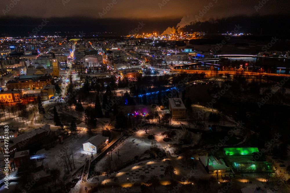Naklejka premium Aerial drone photo of downtown Oulu Finland Night Cityscape in Winter