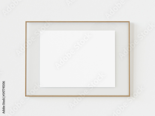 Wooden landscape photo frame portrait with white paper on white wall background. Empty white picture frame mockup template isolated on white wall indoors. 3d illustration