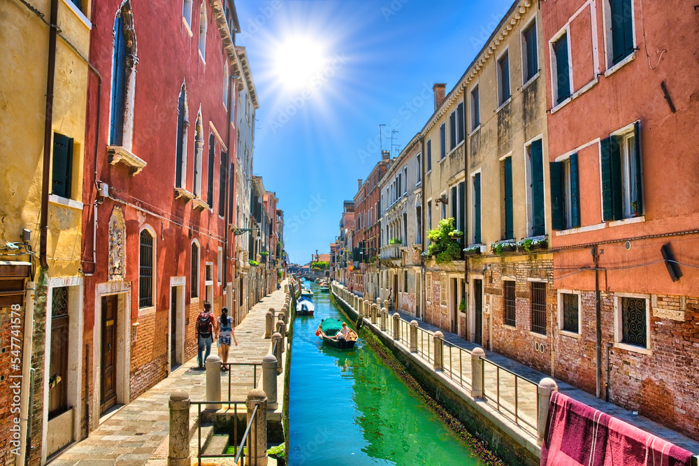 Scenic canal with boats, Venice, Italy, HDR