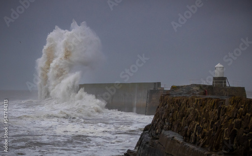 Huge Storm Waves at Pittenweem Harbour, East Neuk, Fife Scotland photo