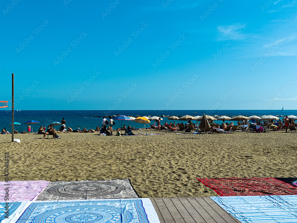 beach chairs and umbrellas, beach neart to see, Spain beach, sand, umbrellas, blue sky