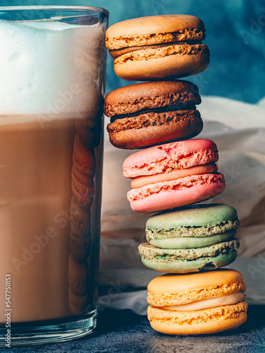 cup of coffee with gift box and macarons, with copy space