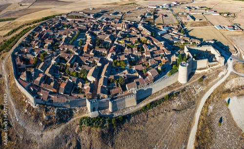 Aerial view of the Spanish medieval town of Urueña in Valladolid, with its famous walls in the foreground.